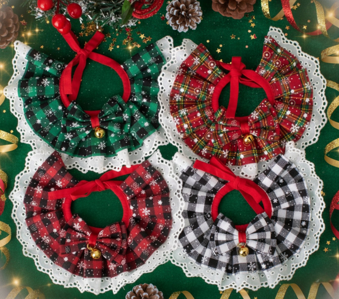 Four decorative Christmas wreaths with red ribbons on a green background.