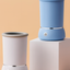 PetNex Automatic Dog Paw Cleaner | Smart Electric Paw Washer & Gentle Silicone Scrubber, one blue and one grey, on a beige background