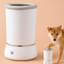 White pet water fountain with a small dog on a beige background