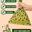 Hand holding a green pet waste bag with features highlighted on a beige background