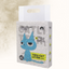 Package of tofu cat litter with a blue cartoon cat design on a textured beige background