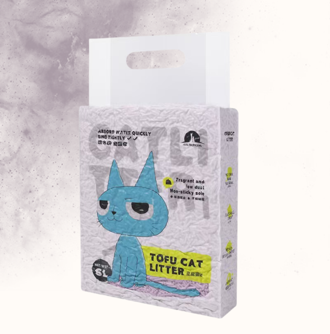 Package of tofu cat litter with a blue cartoon cat design on a gray background