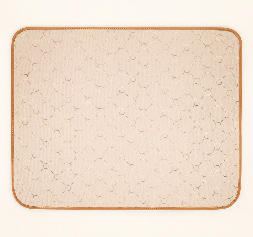 Beige quilted mat with a geometric pattern on a white background