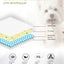Illustration of a layered urine-absorbing pad with a dog in the background