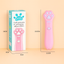 Pink laser pet stick with paw design and packaging on a beige background