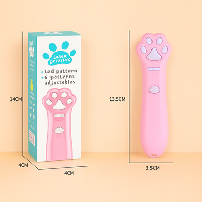 Pink laser pet stick with paw design and packaging on a beige background